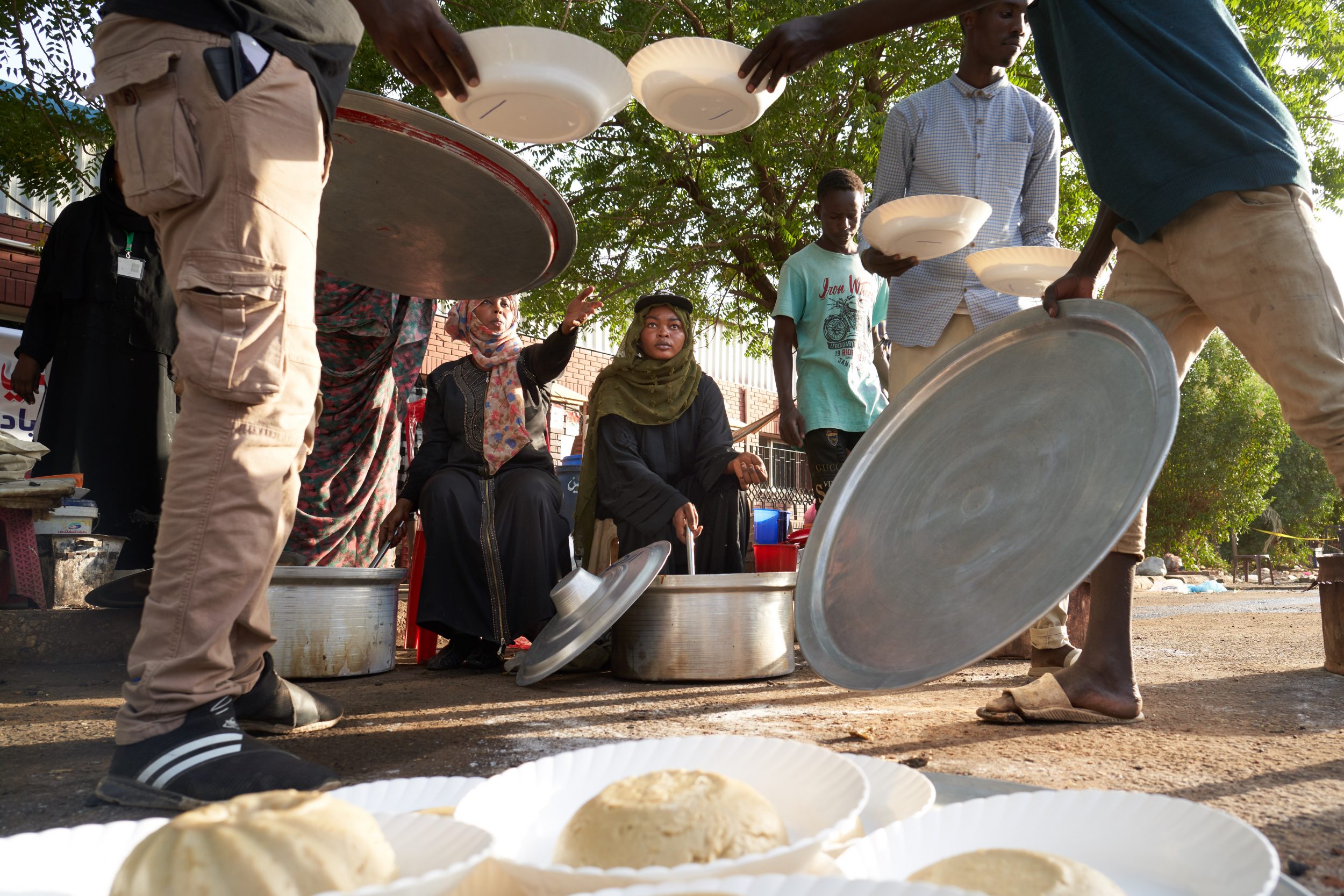 Volunteers cook for protesters at the Sit-In