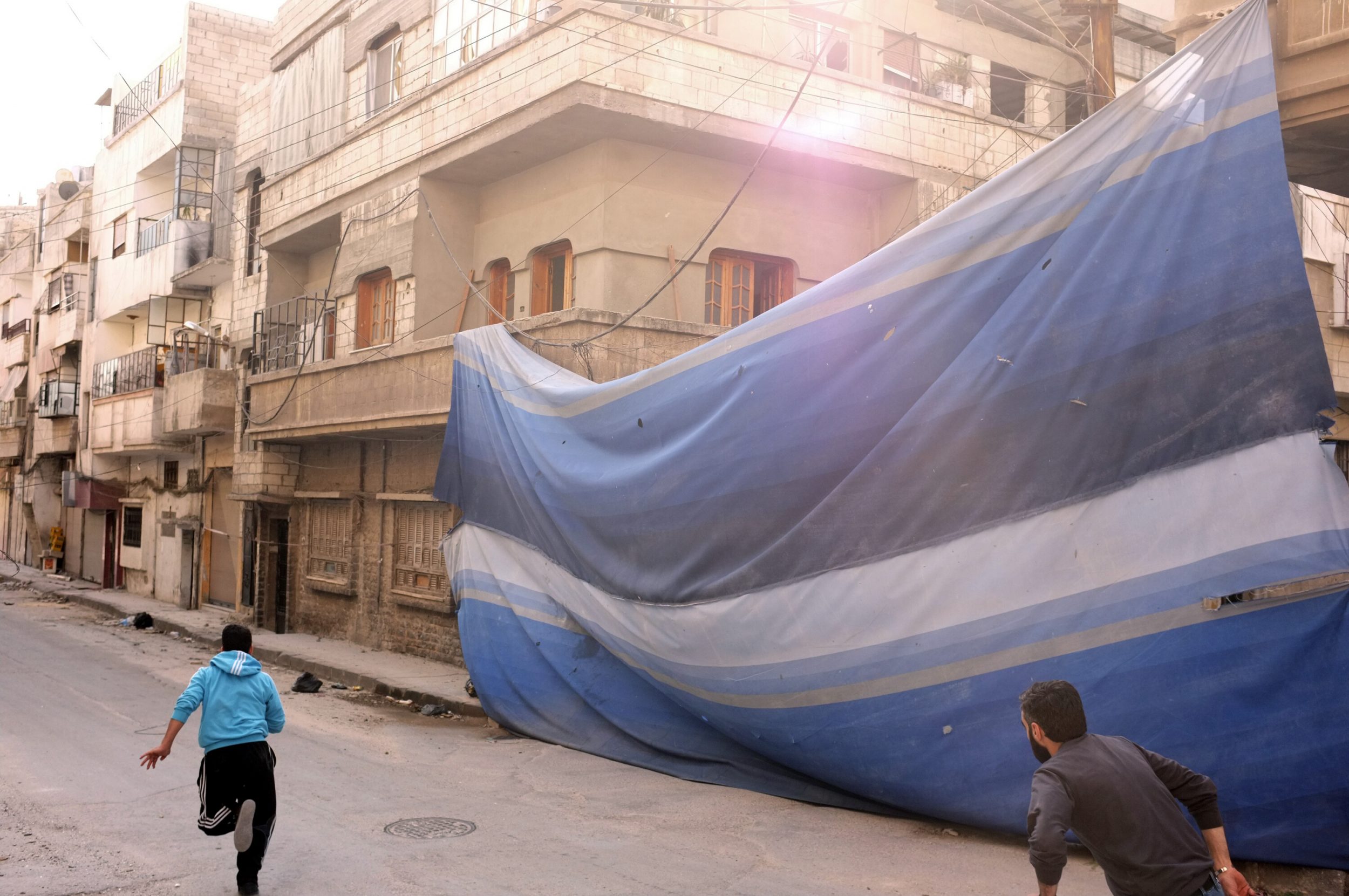 Running from snipers in Homs