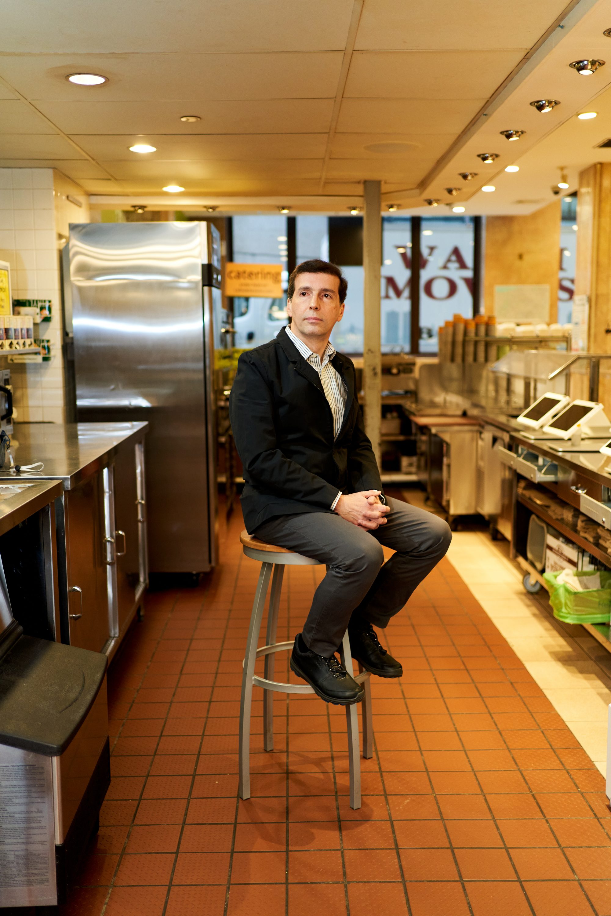 A portrait of Levent Berksan in his shuttered Cafe De Boston on December in Boston, Massachusetts.