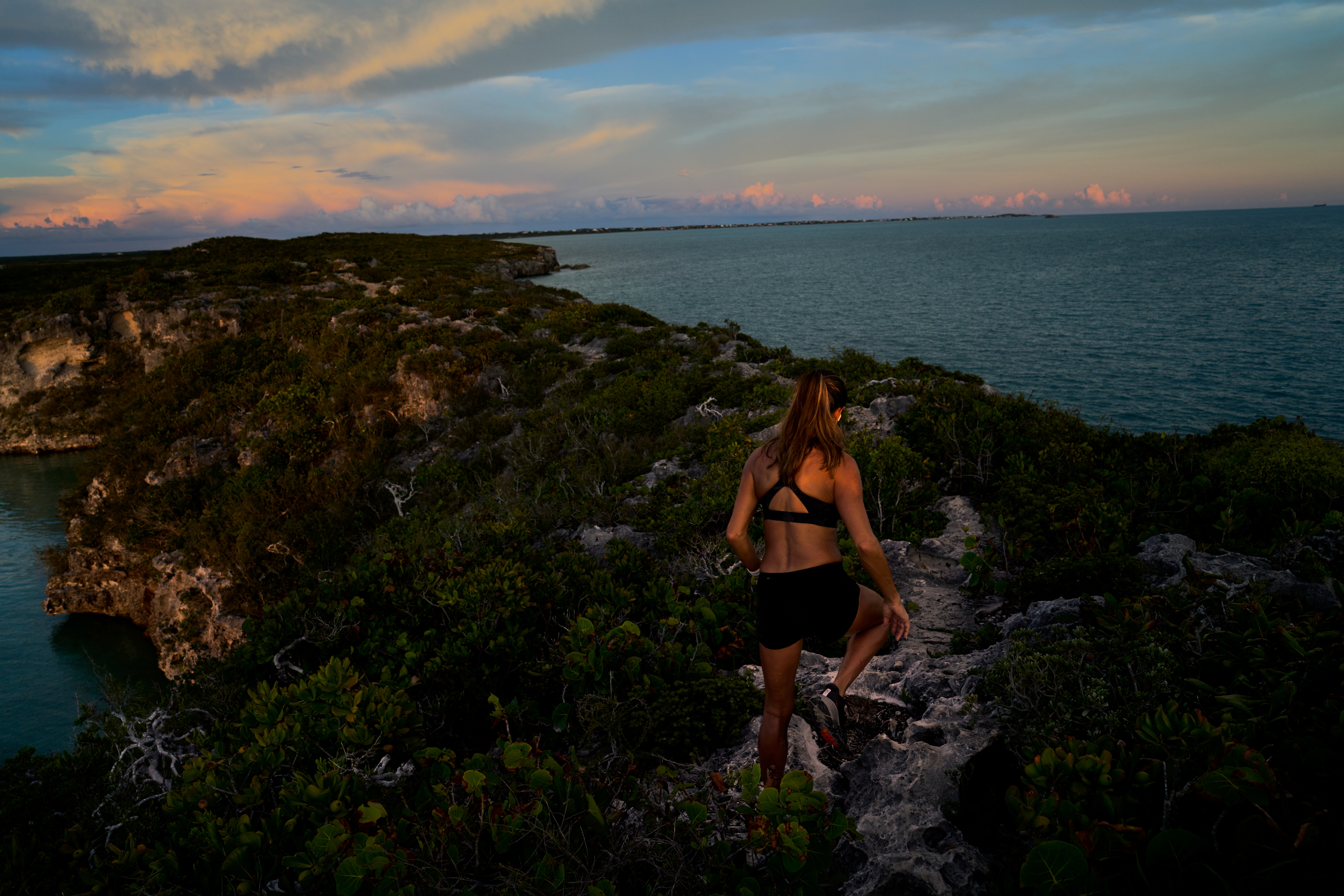 Fitness photography in Turks and Caicos includes paths along rocky outcroppings.
