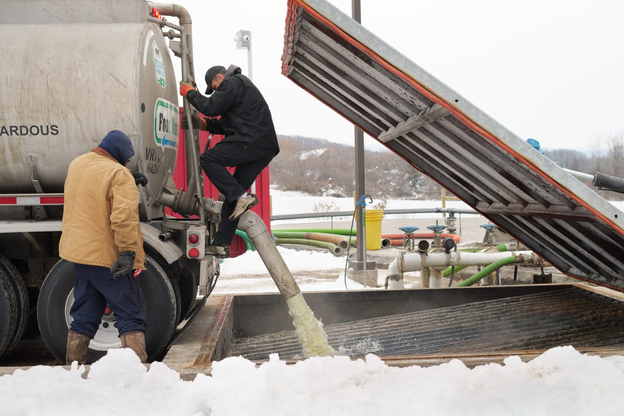 A load of waste material from a milk company is poured into the hydrolyzer, the first step in the digestion process.