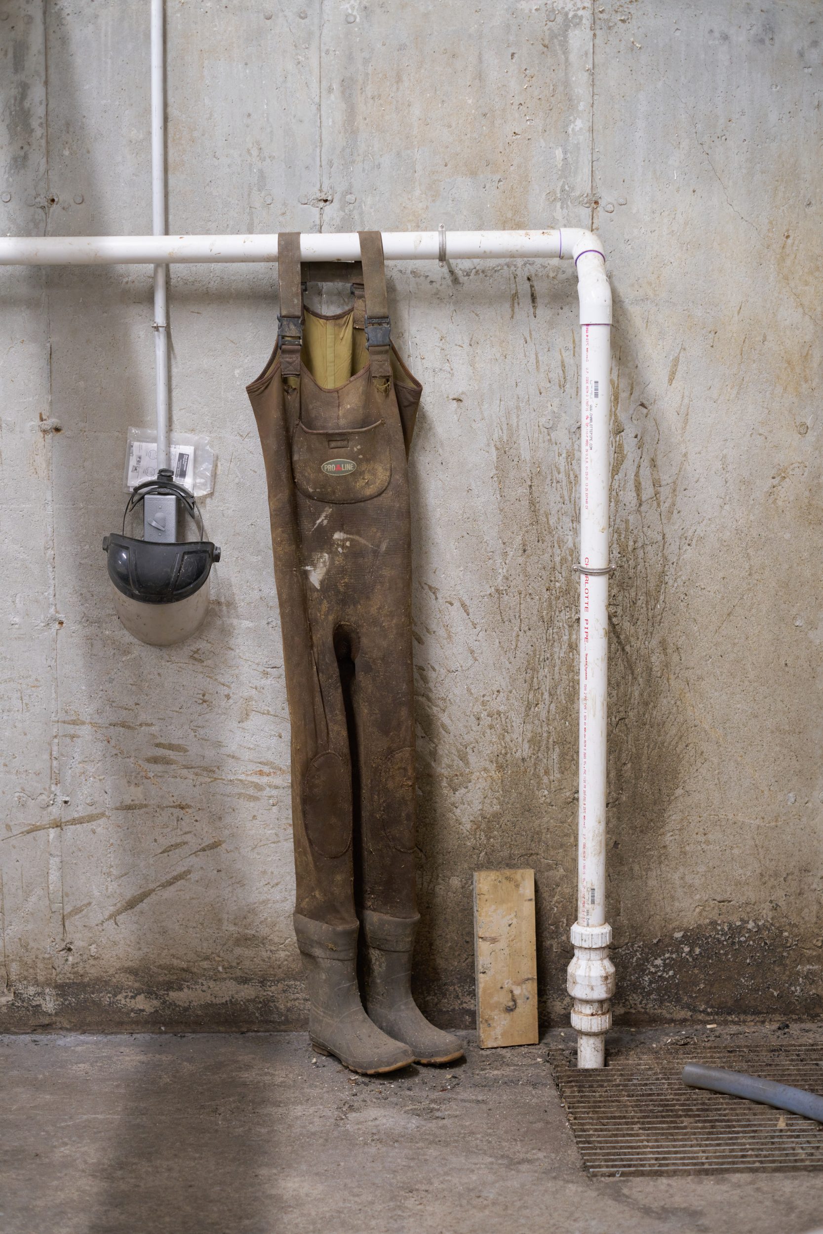 Safety gear hangs beside the manure separator.