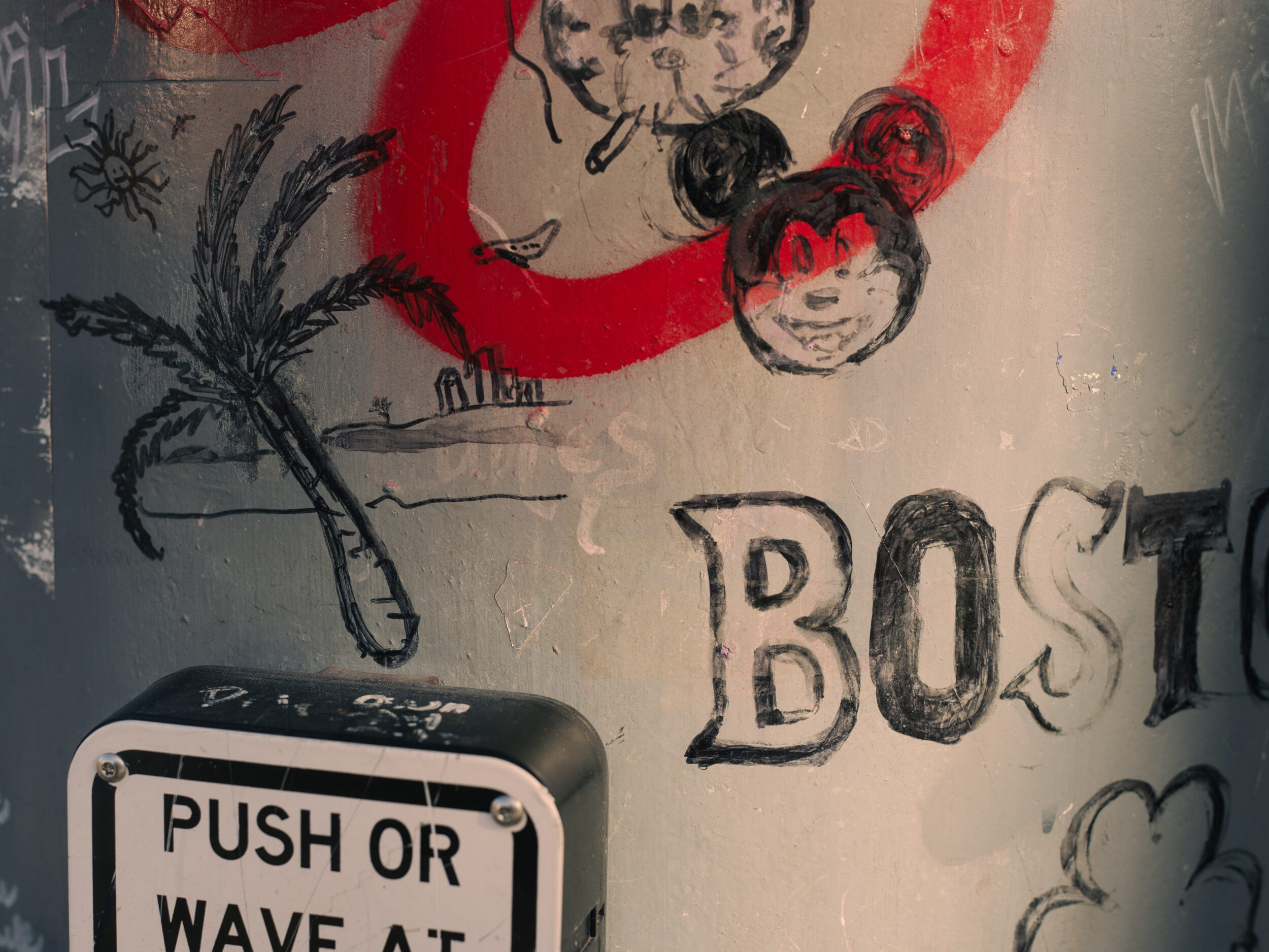 Graffiti and drawings cover a light post at the corner of Massachusetts Avenue and Melnea Cass Boulevard in Boston Graffiti and drawings cover a light post at the corner of Massachusetts Avenue and Melnea Cass Boulevard in Boston