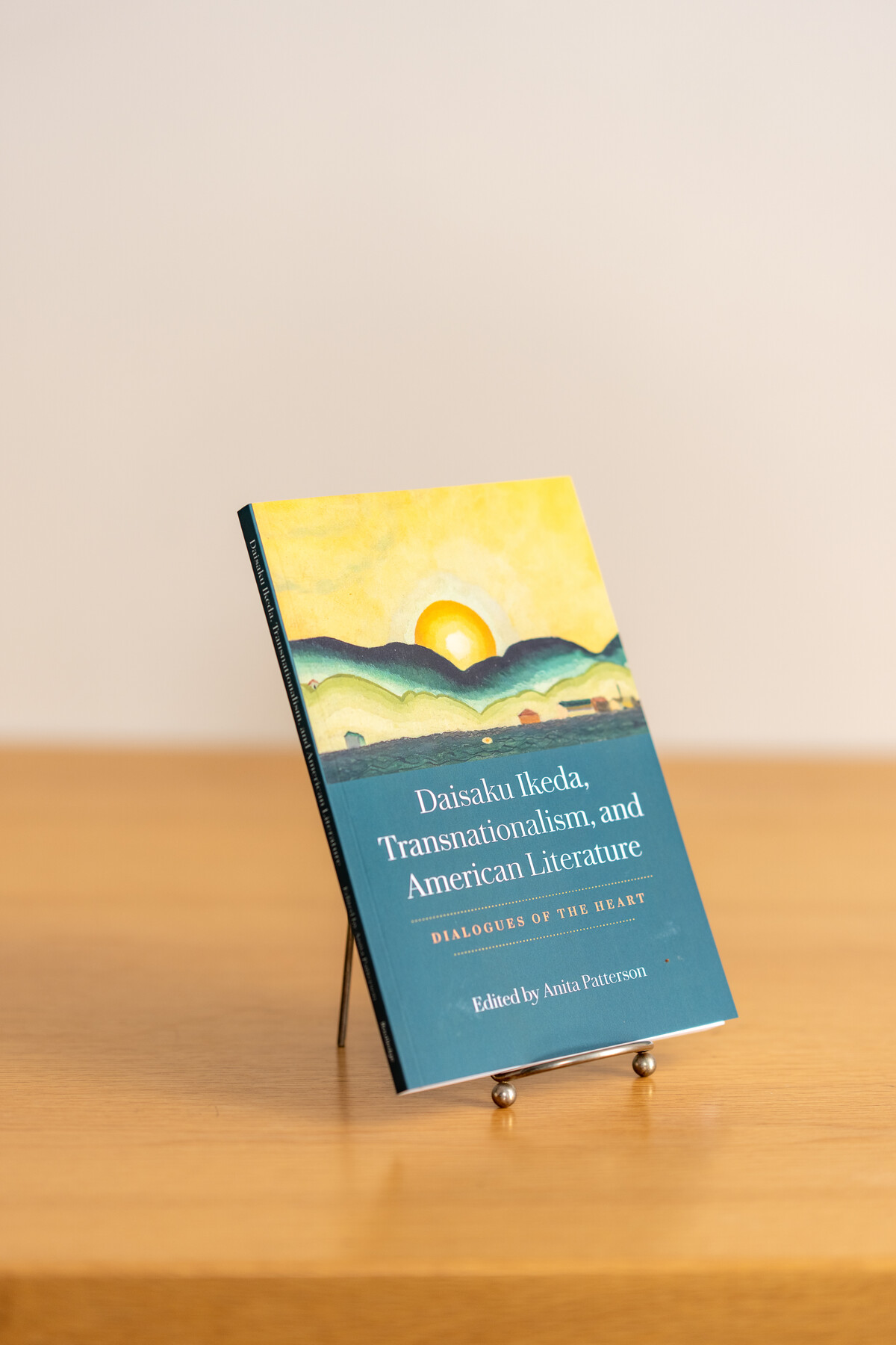Daisaku Ikeda, Transnationalism, and American Literature displayed alone on a metal stand.